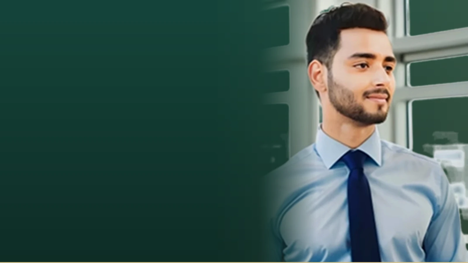Ashish Pathania, an instructional designer, thoughtfully looks ahead while wearing professional business attire.